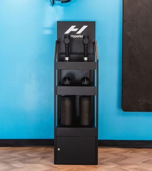 a rack of recovery equipment at trophy fitness gym in dallas