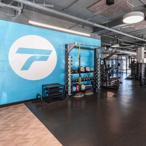 a spacious strength training area at freedom fitness gym in dallas texas near me